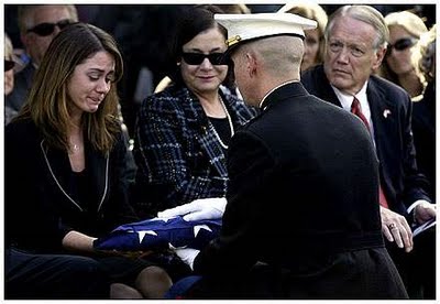 us_marine_capt__prescott_wilson_hands_jp_blecksmith_s_girlfriend_emily_tatt_a_flag_