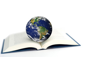 world globe on a open book